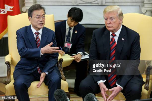 South Korean President Moon Jae-in speaks as President Donald Trump listens during a meeting in the Oval Office of the White House on May 22, 2018 in...
