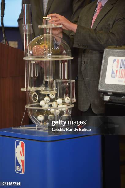 Kiki VanDeWeghe, Executive Vice President of Basketball Operations for the NBA, picks out a ping pong ball during the 2018 NBA Draft Lottery at the...