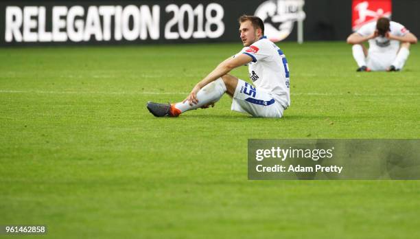 Jonas Foehrenback of Karlsruher SC is dejected after the relegation 2018 2. Bundesliga Playoff Leg 2 match between Erzgebirge Aue and Karlsruher SC...