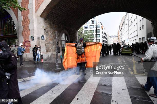 People demonstrate, on May 22, 2018 in Paris, during a nationwide day protest by French public sector employees and public servants against the...