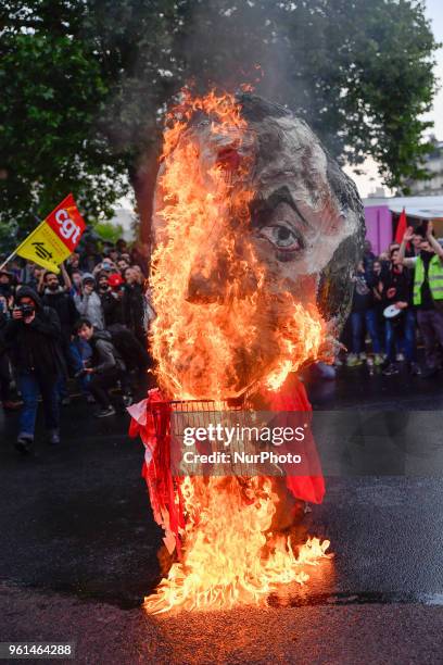 People demonstrate, on May 22, 2018 in Paris, during a nationwide day protest by French public sector employees and public servants against the...