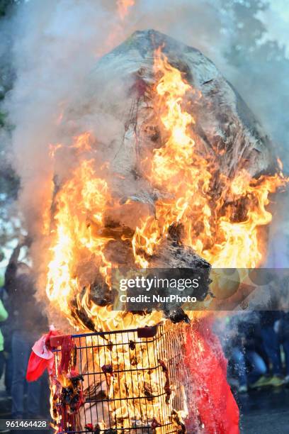 People demonstrate, on May 22, 2018 in Paris, during a nationwide day protest by French public sector employees and public servants against the...