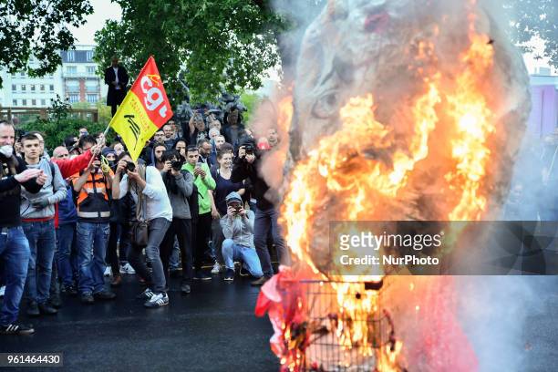 People demonstrate, on May 22, 2018 in Paris, during a nationwide day protest by French public sector employees and public servants against the...