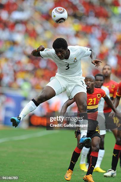 Asamoah Gyan of Ghana and Mabina of Angola during the Africa Cup of Nations Quarter Final match between Angola and Ghana from the November 11 Stadium...