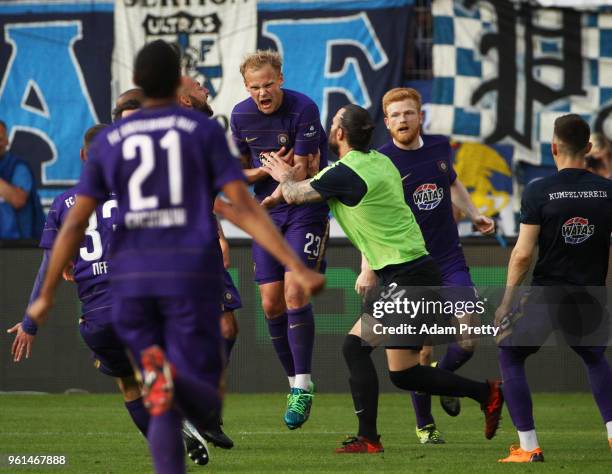 Soeren Bertram of FC Erzgebirge Aue celebrates after scoring his third goal in the relegation 2018 2. Bundesliga Playoff Leg 2 match between...