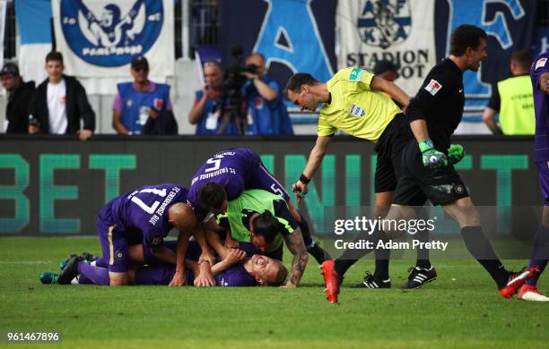 Soeren Bertram of FC Erzgebirge Aue celebrates after scoring his third goal in the relegation 2018 2. Bundesliga Playoff Leg 2 match between...