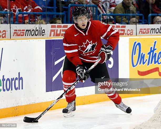 Ryan Ellis of Team Canada skates with the puck during the 2010 IIHF World Junior Championship Tournament Semifinal game against Team Switzerland on...