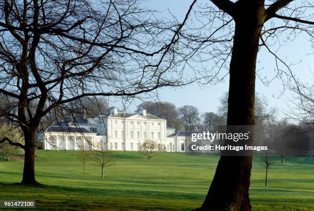 Kenwood House, Hampstead, London, circirca 1990-c2010. Exterior view of the south front of the house viewed through trees in early spring. Artist...