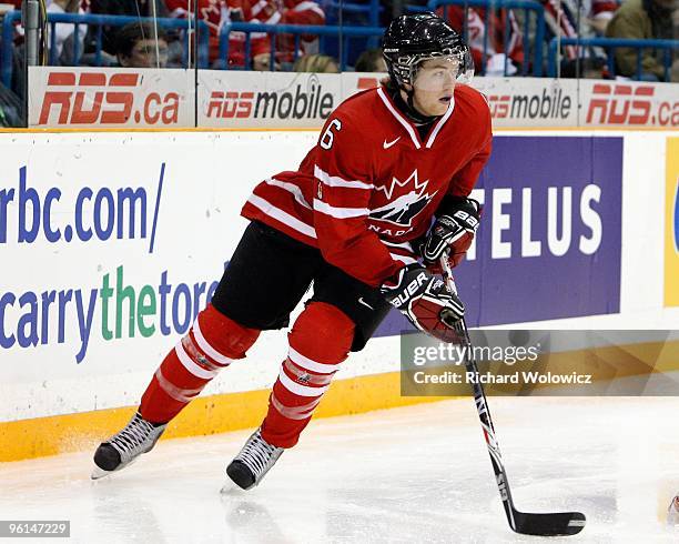 Ryan Ellis of Team Canada skates with the puck during the 2010 IIHF World Junior Championship Tournament Semifinal game against Team Switzerland on...