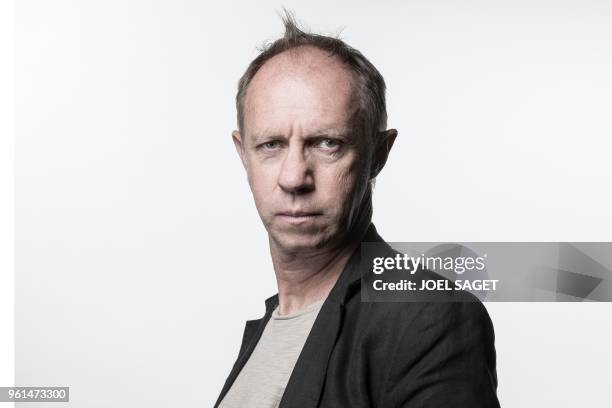 French writer Vincent Ravalec poses during a photo session in Paris on May 22, 2018.