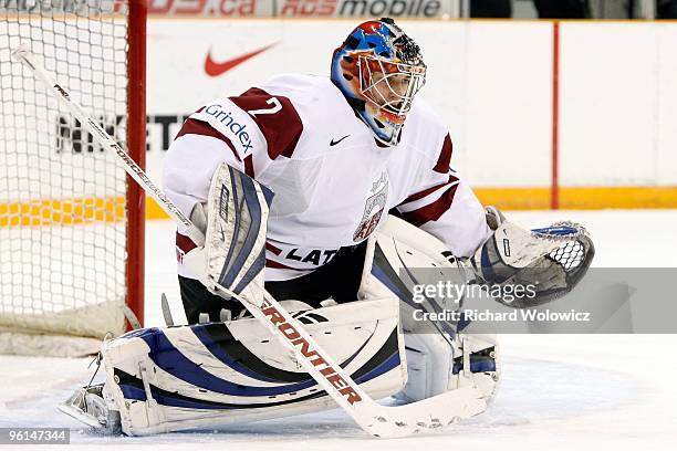 Janis Kalnins of Team Latvia watches play during the 2010 IIHF World Junior Championship Tournament Relegation game against Team Czech Republic on...