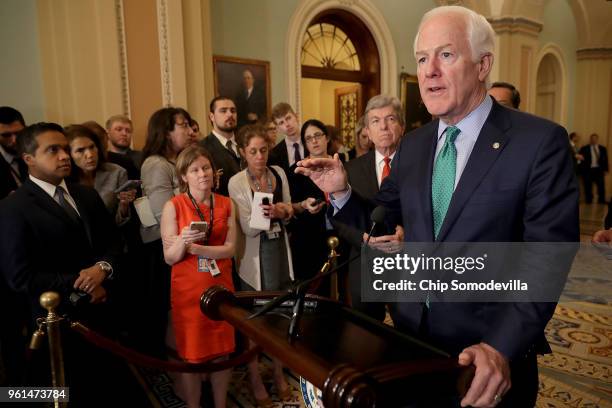 Senate Majority Whip John Cornyn talks to reporters follow the weekly Senate Republican policy luncheon at the U.S. Capitol May 22, 2018 in...