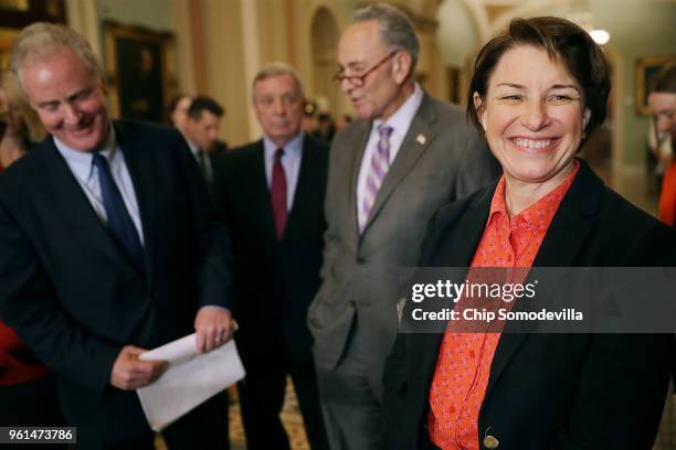 Sen. Amy Klobuchar talks to reporters with Sen. Chris Van Hollen and Senate Minority Leader Charles Schumer following the weekly Senate Republican...