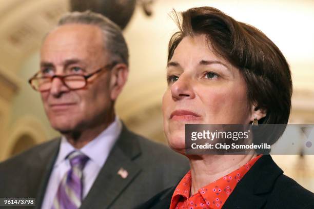 Sen. Amy Klobuchar talks to reporters with Senate Minority Leader Charles Schumer following the weekly Senate Democratic policy luncheon at the U.S....