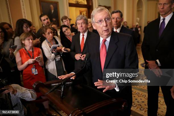 Senate Majority Leader Mitch McConnell talks to reporters follow the weekly Senate Republican policy luncheon at the U.S. Capitol May 22, 2018 in...