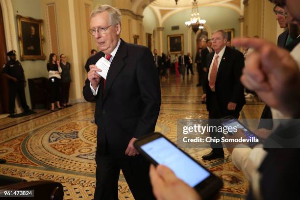 Senate Majority Leader Mitch McConnell talks to reporters follow the weekly Senate Republican policy luncheon at the U.S. Capitol May 22, 2018 in...