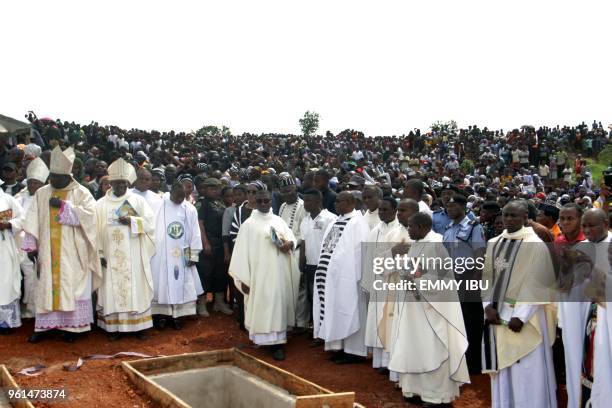 Clergymen prepare to bury some 17 worshippers and two priests, who were allegedly killed by Fulani herdsmen, at Ayati-Ikpayongo in Gwer East district...