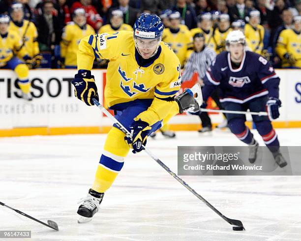 Magnus Svensson Paajarvi of Team Sweden shoots the puck during the 2010 IIHF World Junior Championship Tournament Semifinal game against Team USA on...