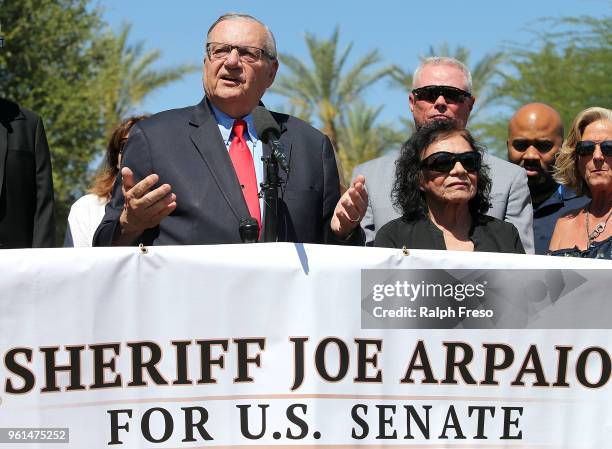 Former Maricopa County Sheriff Joe Arpaio speaks to the media in front of the Arizona State Capitol before filing petitions to run for the U.S....