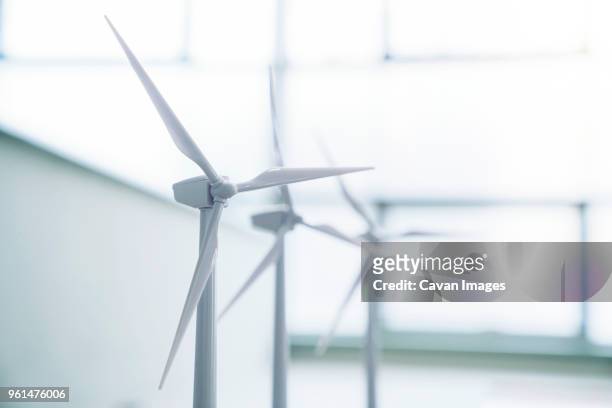 close-up of wind turbine models at office - architekturmodell stock-fotos und bilder