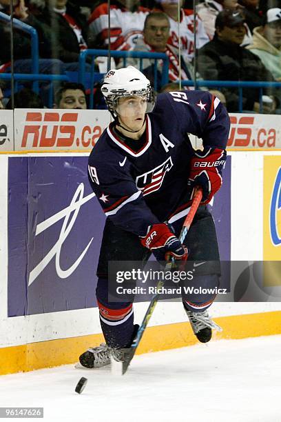 Jordan Schroeder of Team USA skates with the puck during the 2010 IIHF World Junior Championship Tournament Semifinal game against Team Sweden on...