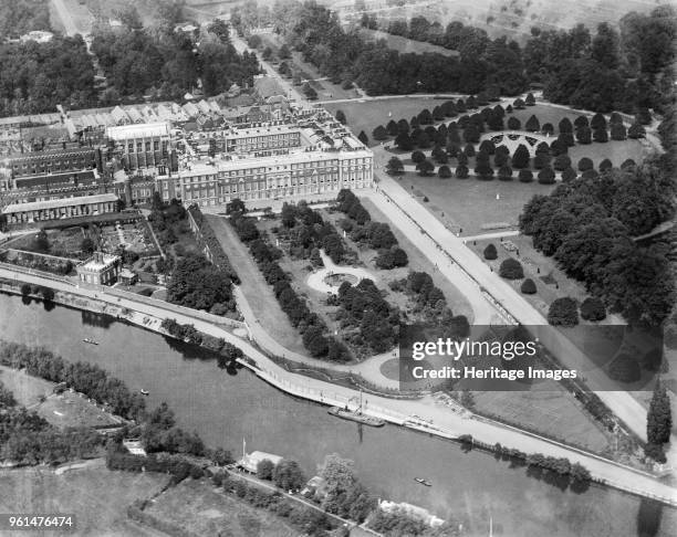 Hampton Court Palace, Richmond-upon-Thames, London, 1920. Aerial view of the palace, the gardens and the River Thames. Artist Aerofilms.