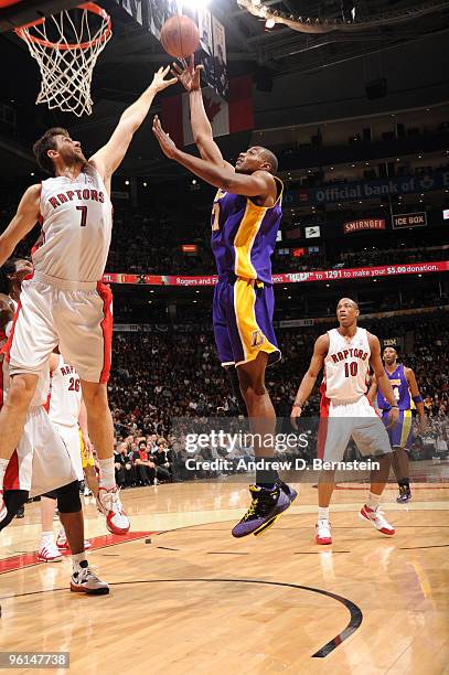 Andrew Bynum of the Los Angeles Lakers tries the hookshot in the lane over Andrea Bargnani of the Toronto Raptors during a game on January 24, 2010...