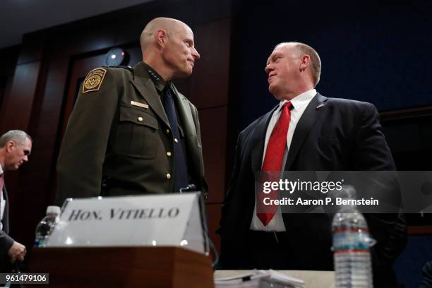 Thomas Homan, acting director of U.S. Immigration and Customs Enforcement, talks with Ronald Vitiello, acting deputy commissioner of U.S. Customs and...