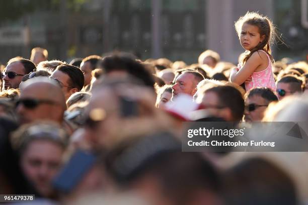 People pause pack into the streets near Albert Square on the first anniversary of the Manchester terrorist attack on May 22, 2018 in Manchester,...