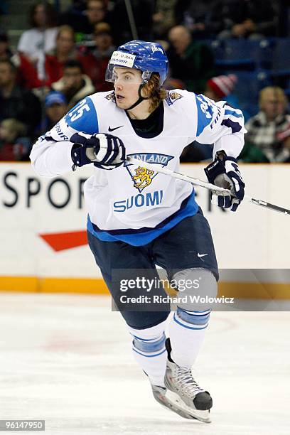 Veli-Matti Vittasmaki of Team Finland skates during the 2010 IIHF World Junior Championship Tournament Fifth Place game against Team Russia on...