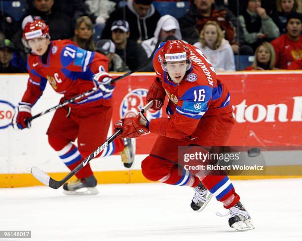 Petr Khokhriakov of Team Russia passes the puck during the 2010 IIHF World Junior Championship Tournament Fifth Place game against Team Finland on...