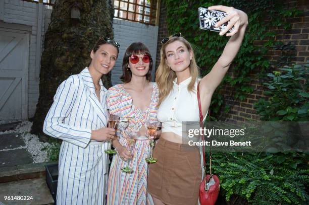 Charlotte Wiggins, Sam Rollinson and Eve Delf attend the NET-A-PORTER dinner, hosted by Alison Loehnis, to celebrate the launch of Rosie Assoulin's...