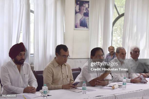 Delhi AICC in-charge P. C. Chacko speaks as DPCC President Ajay Maken, party leader Arvinder Singh Lovely and others look on during a monthly meeting...