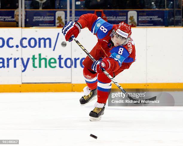 Alexander Burmistrov of Team Russia passes the puck during the 2010 IIHF World Junior Championship Tournament Fifth Place game against Team Finland...