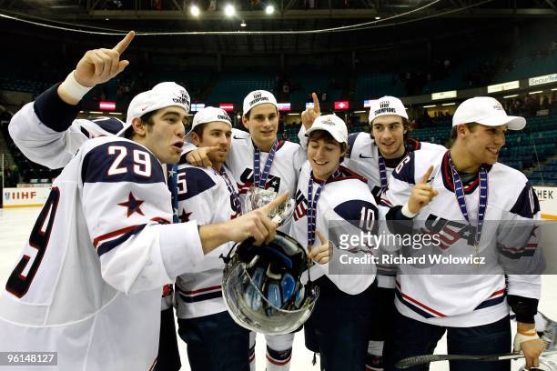 Members of Team USA celebrate after defeating Team Canada at the 2010 IIHF World Junior Championship Tournament Gold Medal game on January 5, 2010 at...