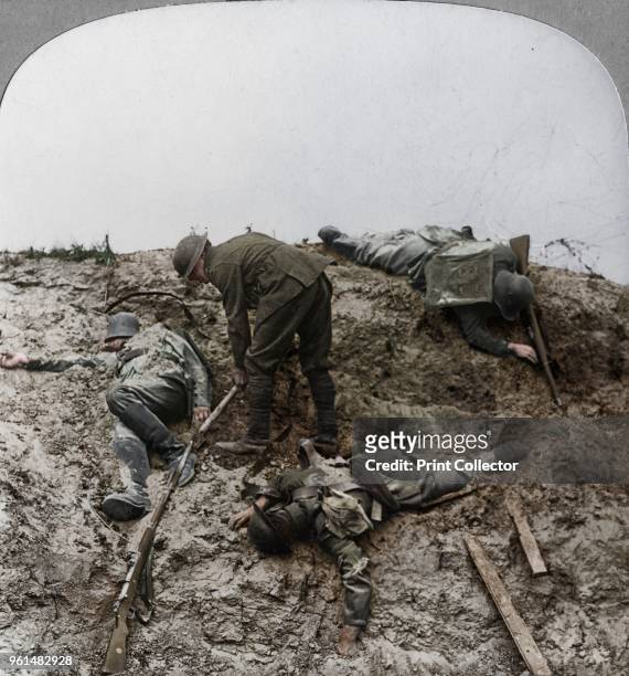 British casualties, Ypres salient, Belgium, World War I, 1915. Uncovering men who fell contesting the crater at Zouave Wood. Zouave Wood was stormed...