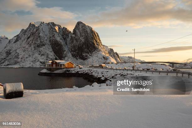 fishing village sakrisoy on lofoten islands (norway) during a sunny winter day - rorbuer stock pictures, royalty-free photos & images