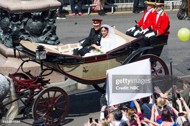 Prince Harry and Meghan Markle ride in an Ascot Landau carriage after their wedding ceremony at St. George's Chapel in Windsor Castle on Saturday May...