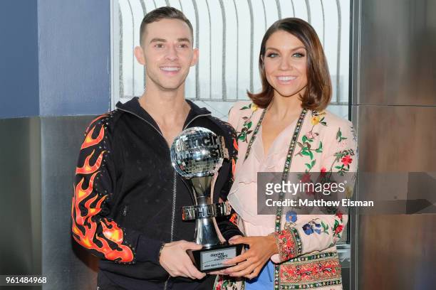 Figure skater Adam Rippon and dancer Jenna Johnson pose together for a photo to celebrate the 'Dancing With The Stars' Finale at The Empire State...