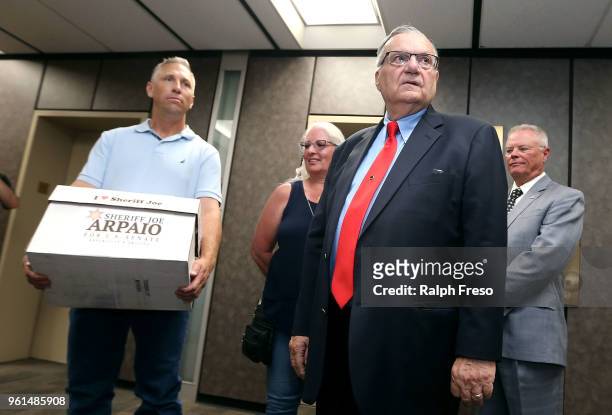 Former Maricopa County Sheriff Joe Arpaio waits at the Arizona State Capitol to file petitions to run for the U.S. Senate on May 22, 2018 in Phoenix,...