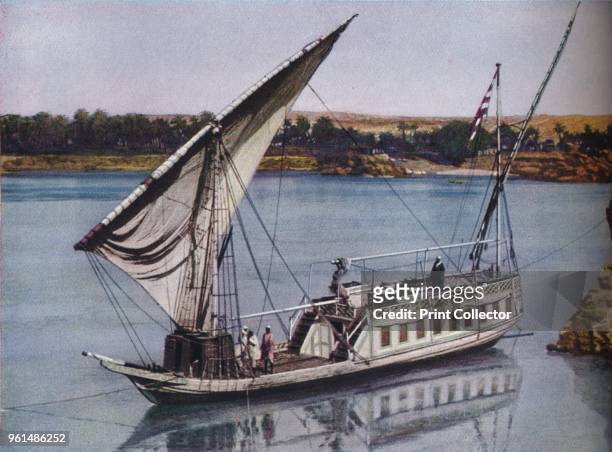 Egypt. Developed from the painted galleys used by the Pharaohs, the dahabiyehs plying on the Nile to-day are roomy houseboats', circa 1930s. From...