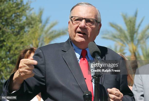 Former Maricopa County Sheriff Joe Arpaio speaks to the media in front of the Arizona State Capitol before filing petitions to run for the U.S....