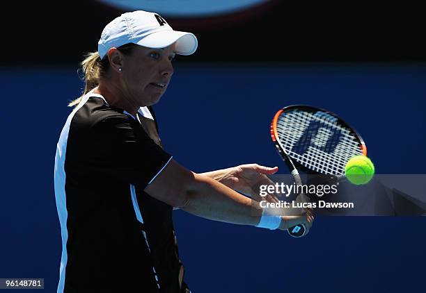 Lisa Raymond of the USA plays a backhand in her third round doubles match with Rennae Stubbs of Australia against Yung-Jan Chan of Chinese Taipei and...