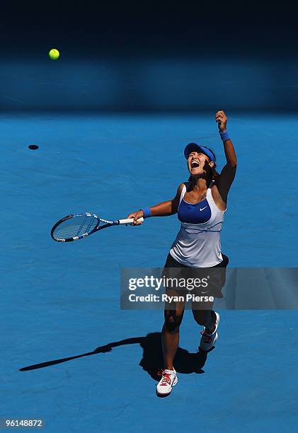 Na Li of China celebrates winning her fourth round match against Caroline Wozniacki of Denmark during day eight of the 2010 Australian Open at...