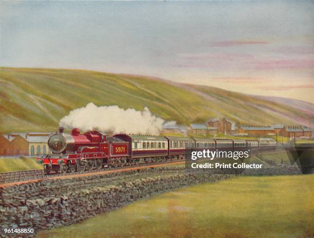 The West Coast Scotsman At Full Speed Near Tebay, L.M.S.R.', 1926. From a photograph by F. E. Mackay. From My Railway Book, No. 40, by Cecil J....