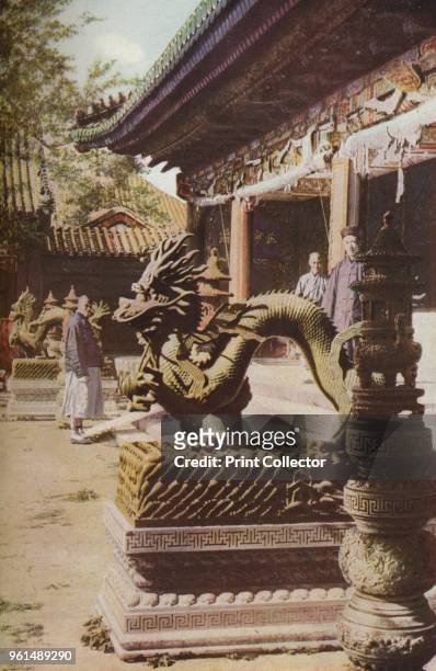 Peking. By the side of the steps leading up to the palace of the late Empress-Dowager are two splendid dragons with arched backs', early 19th...