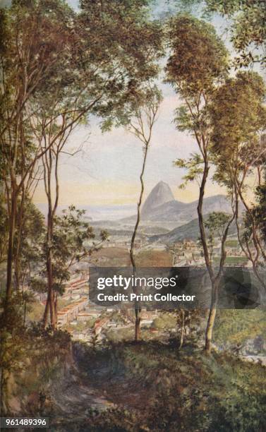 Rio de Janeiro. Through a window in the woods on Mount Santa Thereza one looks don upon the roofs of the suburb of Lapa', circa 1930s. From...