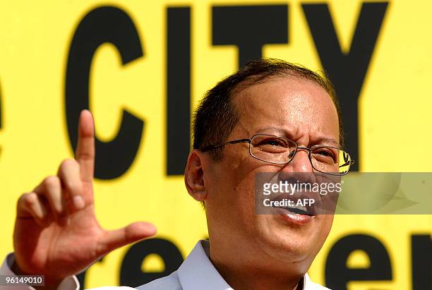 Philippine presidential candidate and Senator Benigno 'Noynoy' Aquino , son of Democracy icon and former president Corazon Aquino flashes a 'Laban...