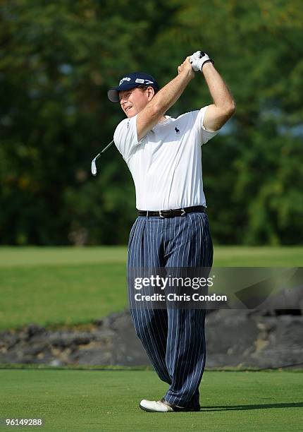 Tom Watson tees off on during the final round of the Mitsubishi Electric Championship at Hualalai held at Hualalai Golf Club on January 24, 2010 in...