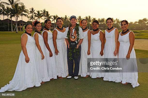 Local hula dancers pose with Tom Watson after Watson wins the Mitsubishi Electric Championship at Hualalai held at Hualalai Golf Club on January 24,...